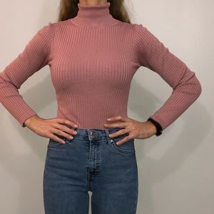 Naked Wardrobe pink long sleeve bodysuit.